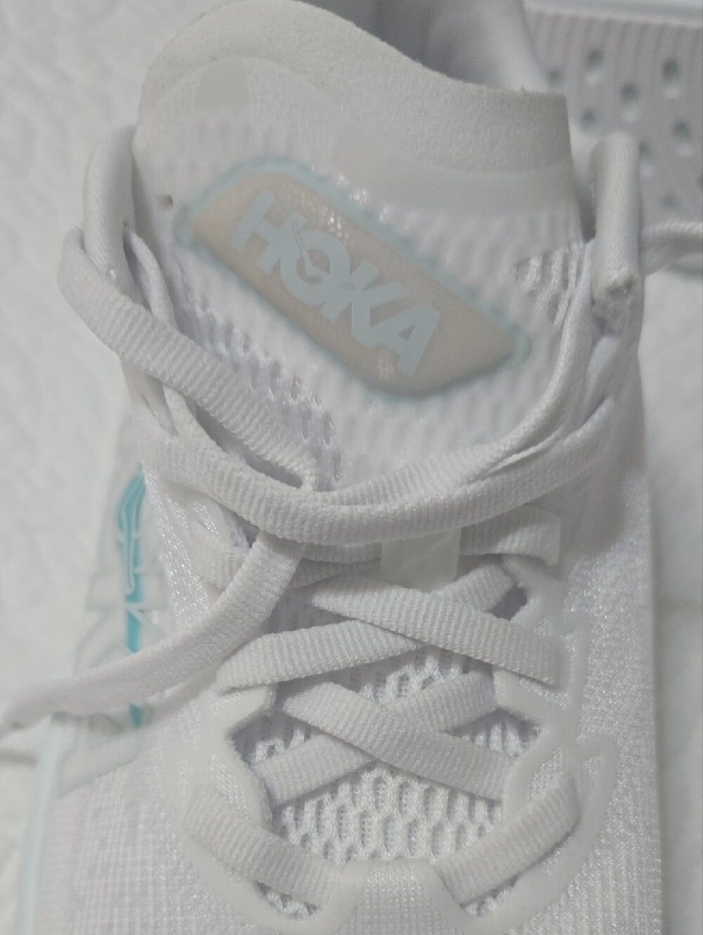 Hoka One One White Running Shoes with Light Blue Accents - Picture 5 of 6